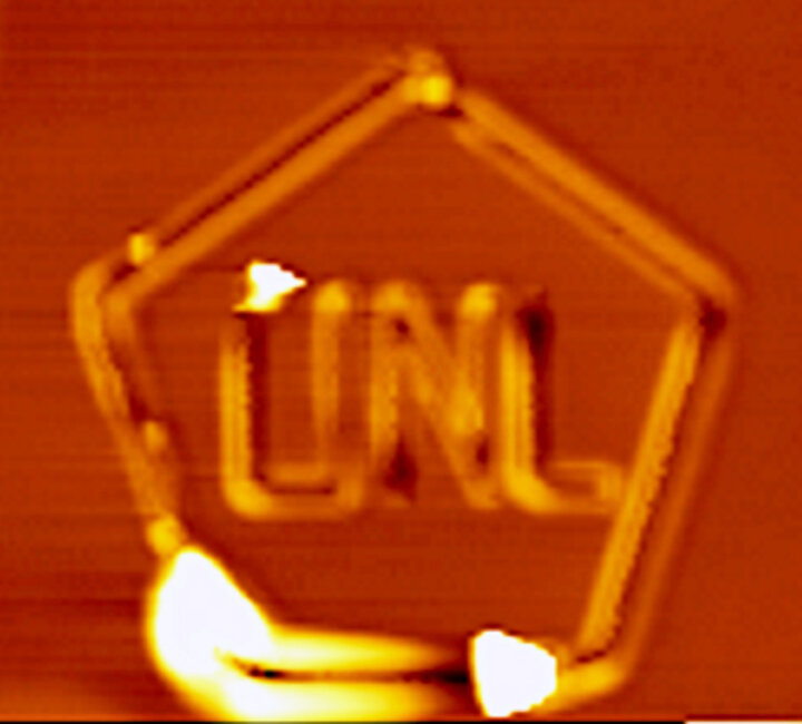 Nanomanipulation that spells out "UNL"